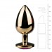 Metalen buttplug met paarse diamant - goudkleurig